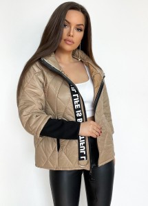 Kurtka pikowana Beauty ze stójką i ozdobną taśmą  - beżowa